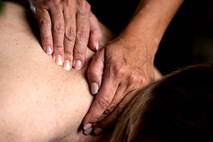 Massage am Nacken